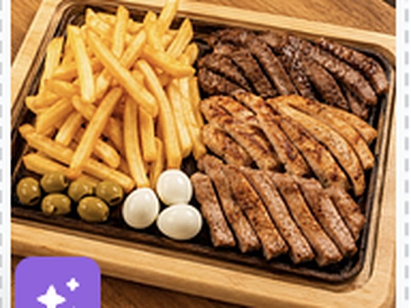Tábua com carne grelhada, batatas fritas, azeitonas e ovos de codorna